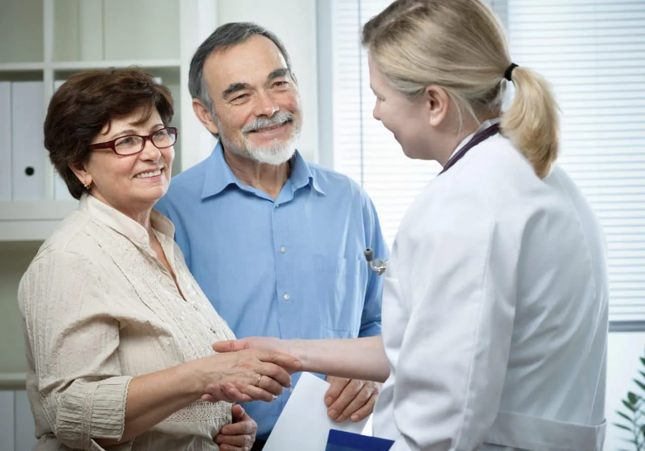Patient undergoing a hearing evaluation in a comfortable, modern exam room